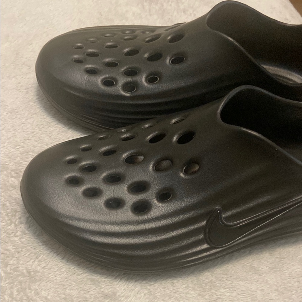 Nike Black Perforated Slip-Ons